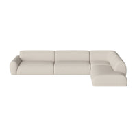 Light beige sectional sofa with a smooth, minimalist design and clean lines. Perfect for modern living spaces.