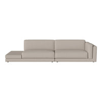 Light beige sectional sofa with a smooth fabric finish and minimalist design. Perfect for modern living spaces.