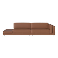 Brown leather sectional sofa with a sleek, minimalist design and smooth texture. Ideal for modern living spaces.