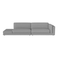 Gray modern sectional sofa with a sleek design and soft fabric upholstery, featuring a minimalist pattern.