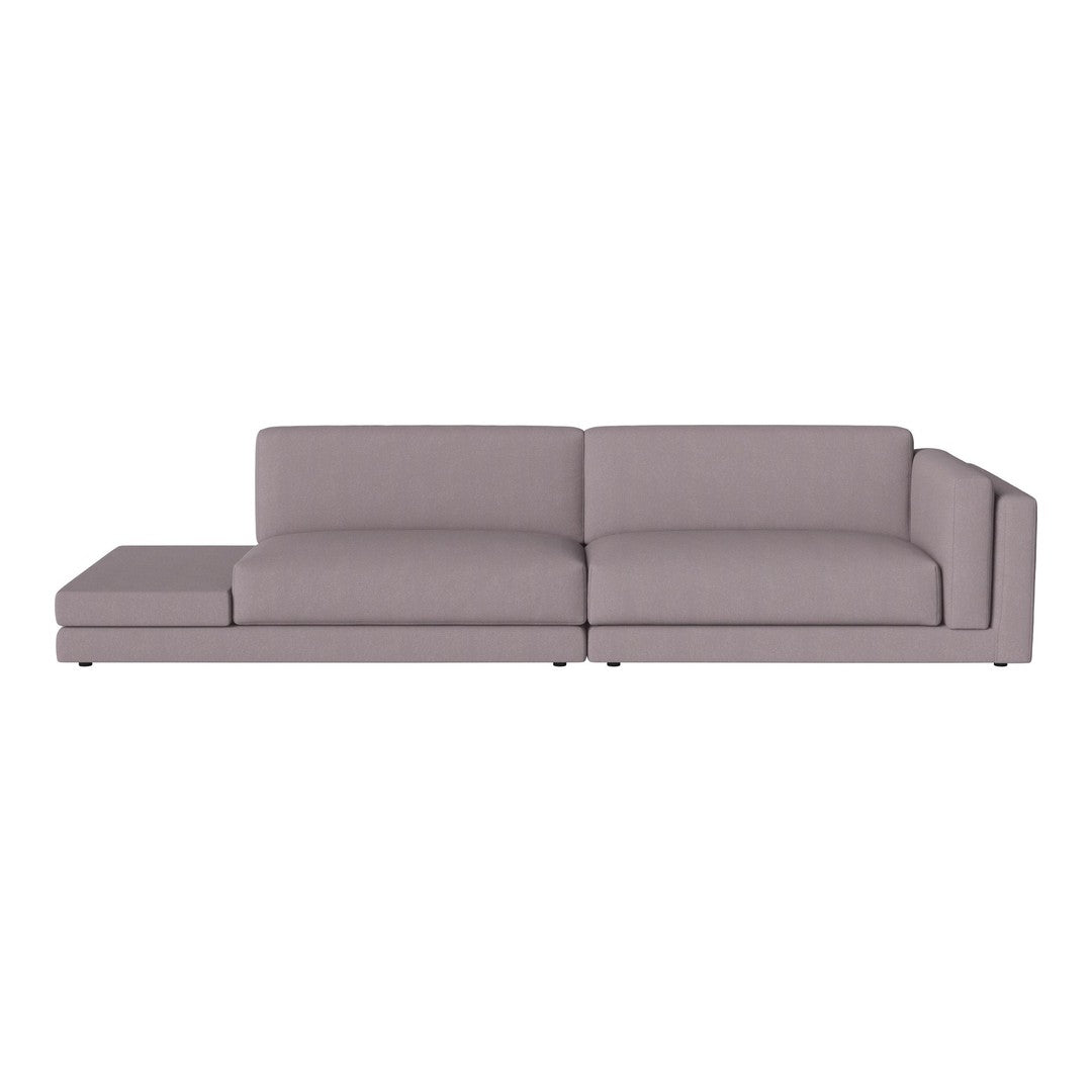 Modern two-tone sectional sofa in soft gray fabric with clean lines and minimalistic design. Perfect for any living space.