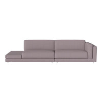 Modern two-tone sectional sofa in soft gray fabric with clean lines and minimalistic design. Perfect for any living space.