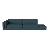 Teal fabric sectional sofa with a sleek modern design and minimal padding, ideal for contemporary living spaces.