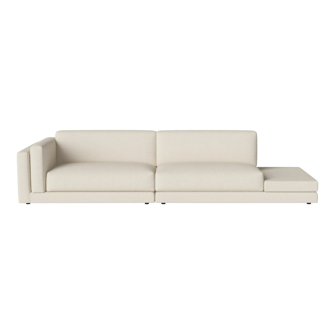 Beige sectional sofa with a modern design and smooth, minimalist lines, perfect for contemporary decor.