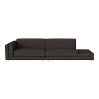 Modern dark gray sectional sofa with a clean, minimalist design, perfect for contemporary living spaces.