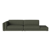 Olive green sectional sofa with a modern design and clean lines, featuring solid color upholstery.