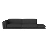 Stylish dark gray sectional sofa with a modern, minimalist design and smooth fabric texture. Ideal for contemporary spaces.