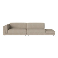 Beige sectional sofa with a smooth, textured fabric and minimalist design, perfect for modern living spaces.