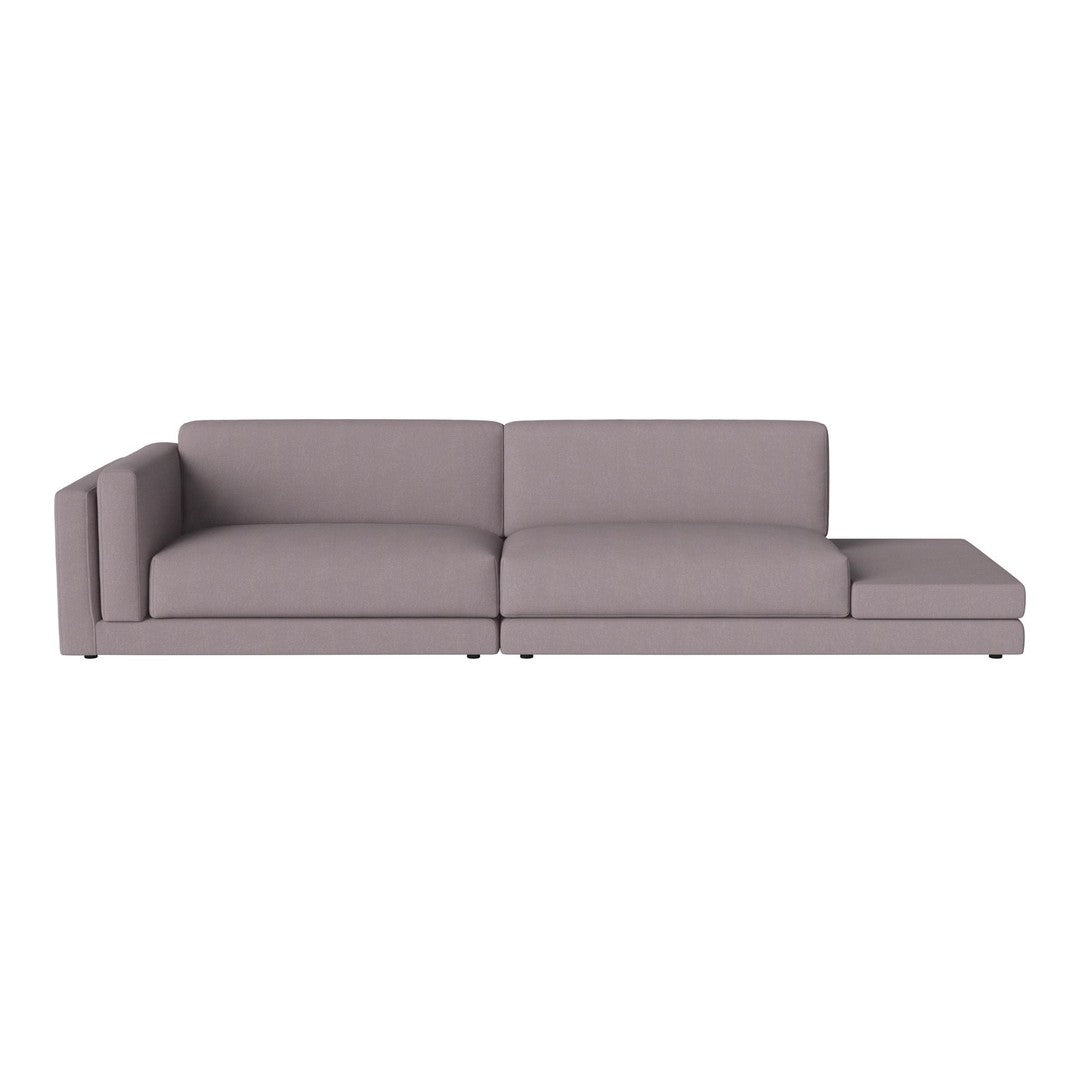 Modern gray sectional sofa with a sleek design and smooth upholstery, ideal for stylish living spaces.