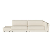 Light cream sectional sofa with a sleek, modern design and smooth, minimalistic upholstery. Perfect for any decor.