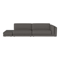 Gray sectional sofa with clean lines and a modern design, featuring solid color upholstery for a sleek look.