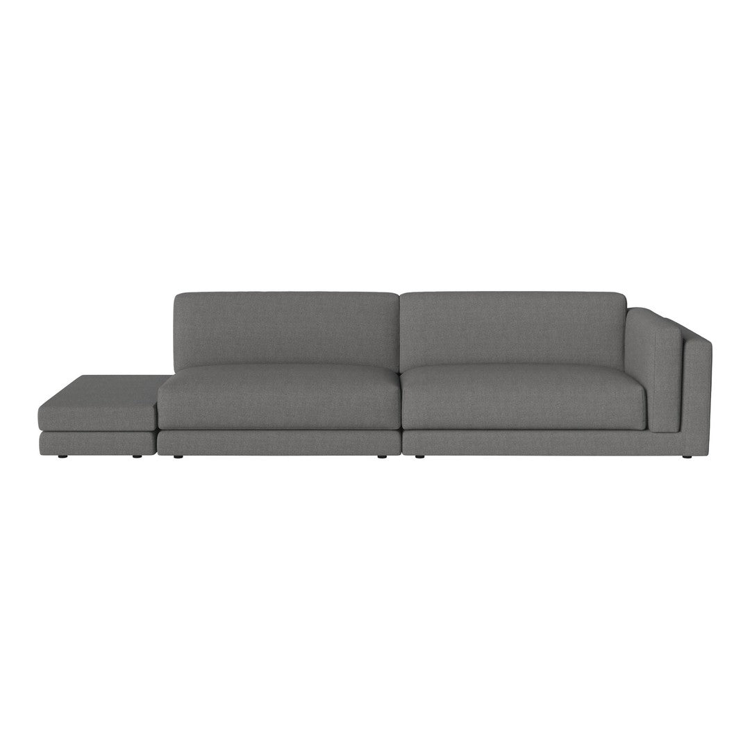 Gray sectional sofa with a sleek, modern design and smooth upholstery, perfect for contemporary living spaces.