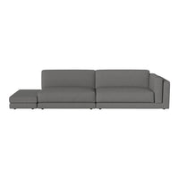 Gray sectional sofa with a sleek, modern design and smooth upholstery, perfect for contemporary living spaces.