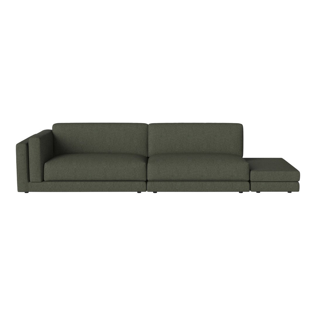 Modern green sectional sofa with a sleek design and textured fabric, perfect for contemporary living spaces.