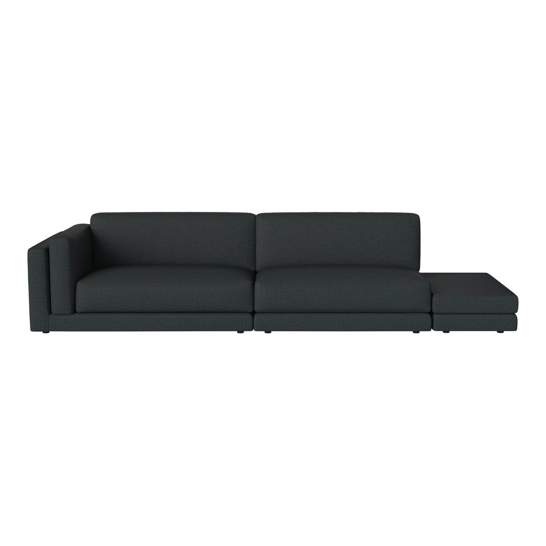 Elegant dark gray sectional sofa with a minimalist design and smooth upholstery, perfect for modern interiors.