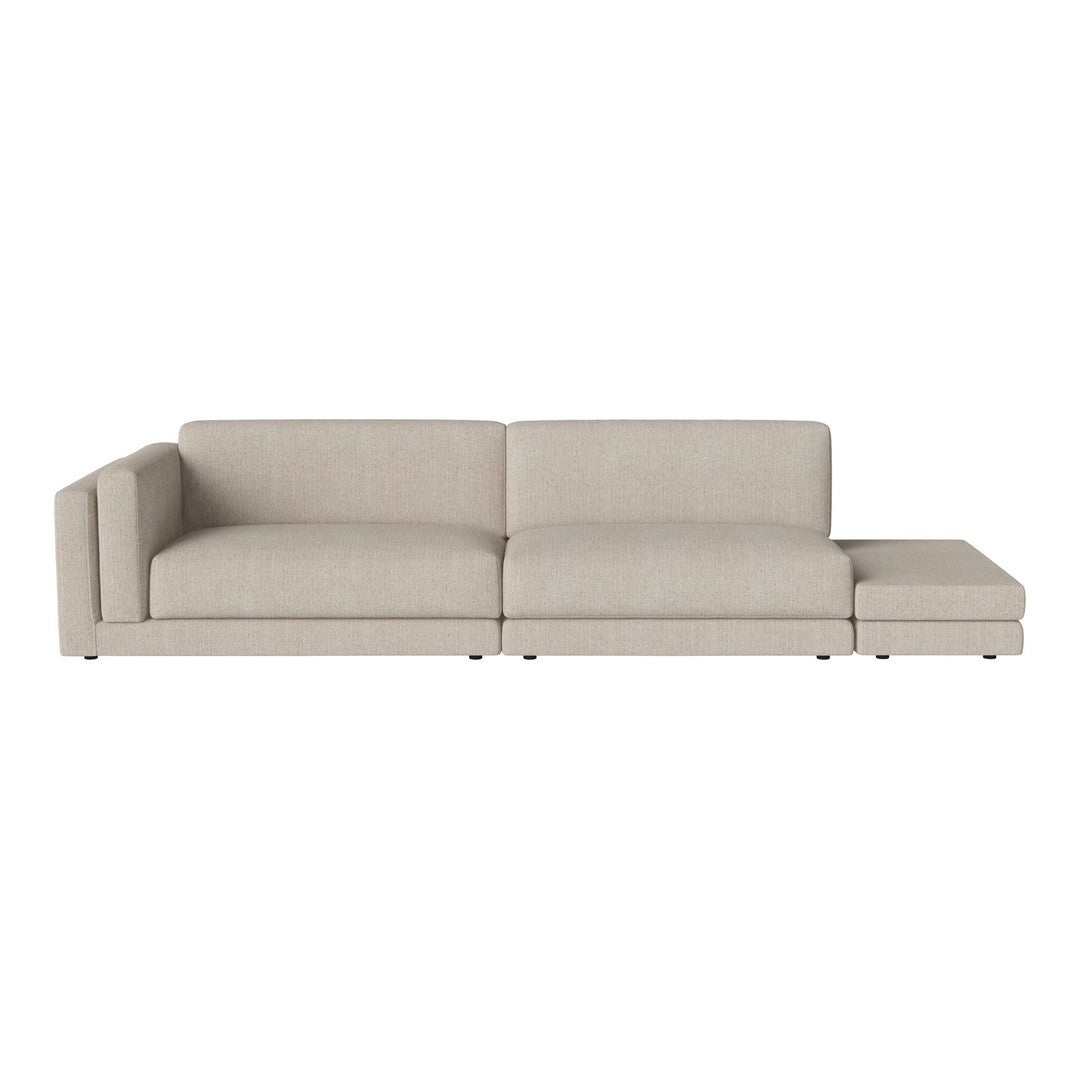 Light beige sectional sofa with a minimalist design and smooth fabric, ideal for contemporary living spaces.