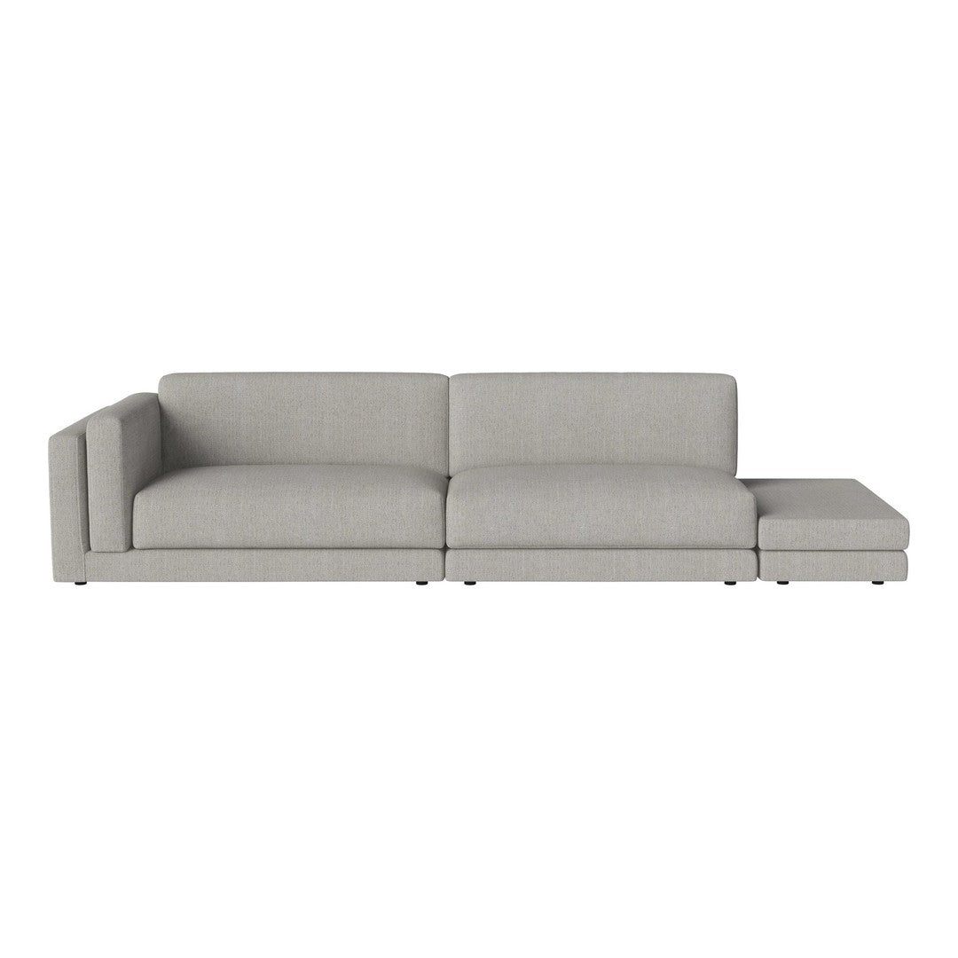 Light gray sectional sofa with a smooth, modern design and subtle textured fabric, perfect for contemporary decor.