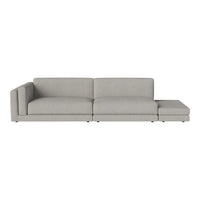 Light gray sectional sofa with a smooth, modern design and subtle textured fabric, perfect for contemporary decor.