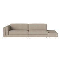 Stylish beige sectional sofa with a contemporary design and smooth fabric texture, perfect for modern living spaces.