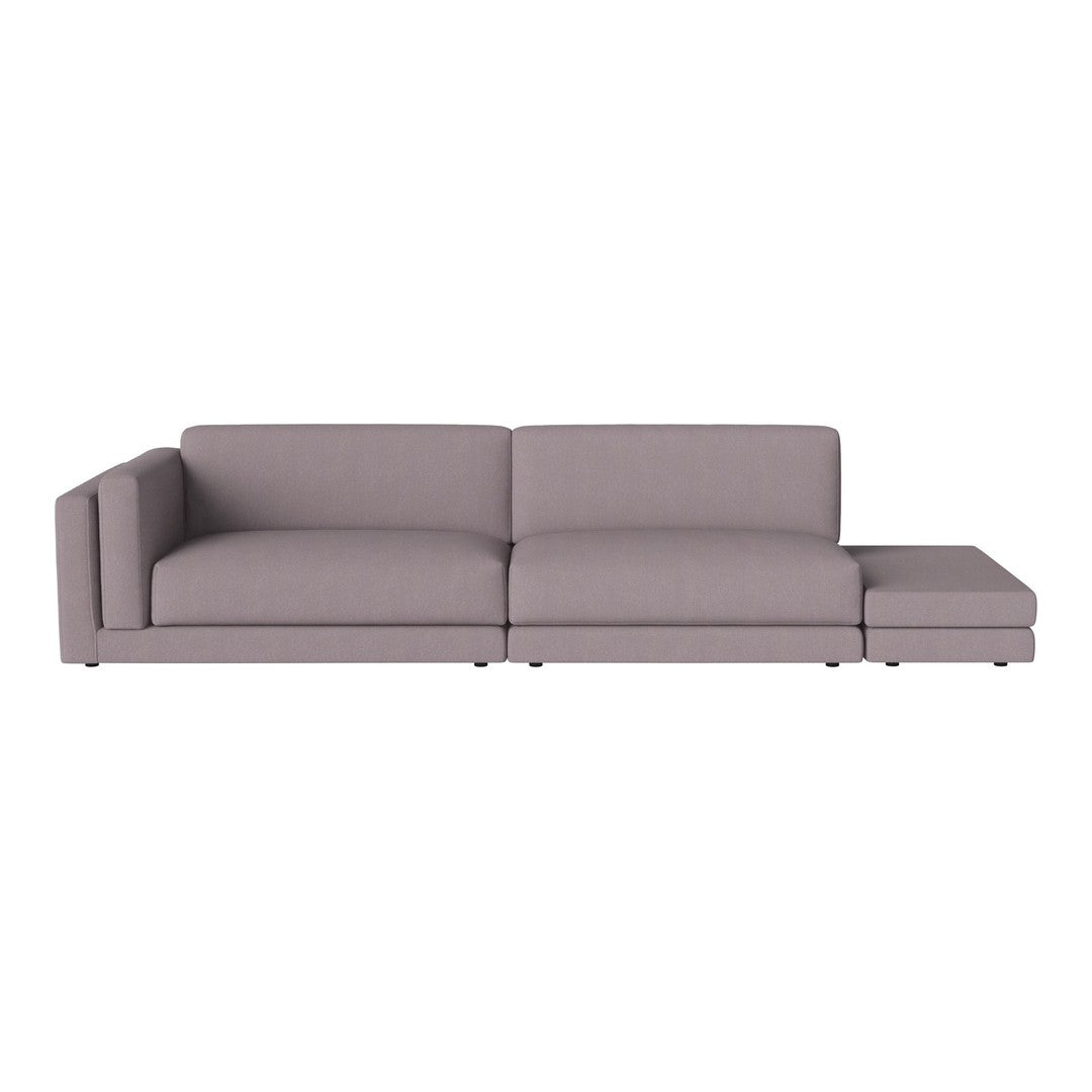 Elegant light purple sectional sofa with a smooth fabric texture and minimalist design, perfect for modern living spaces.