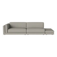Modern gray sectional sofa with clean lines, featuring a minimalist design and soft fabric texture.