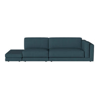Teal upholstered sectional sofa with a modern, minimalist design and smooth fabric finish. Ideal for contemporary decor.