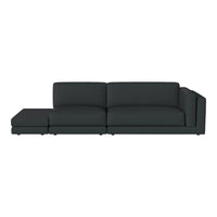 Modern dark gray sectional sofa with clean lines and a minimalist design, perfect for contemporary living spaces.