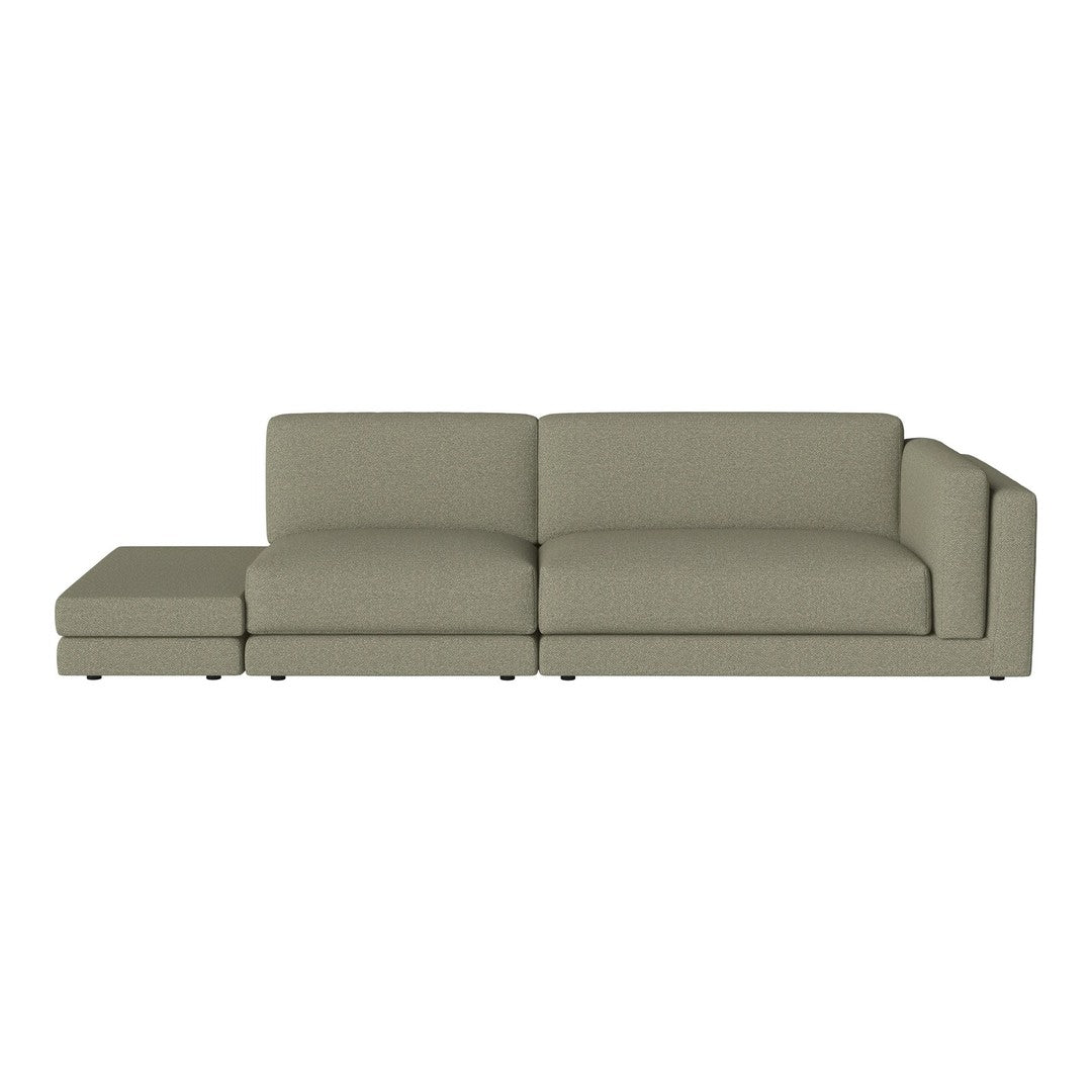 Light olive green sectional sofa with a modern design and smooth, textured upholstery. Perfect for stylish living spaces.