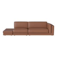 Brown leather sectional sofa with smooth, minimalist design and clean lines. Ideal for modern living spaces.