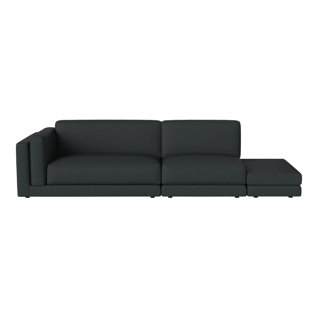 Modern dark gray sectional sofa with clean lines and minimalistic design, perfect for contemporary living spaces.