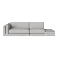 Light gray sectional sofa with simple, modern design and smooth fabric texture.