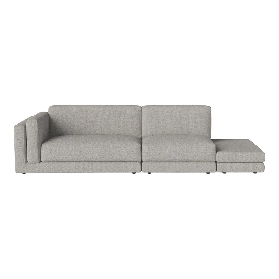 Light gray modular sofa with a minimalist design and smooth, textured fabric. Ideal for modern living spaces.