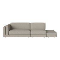 Light beige sectional sofa with a minimalist design and smooth fabric upholstery.