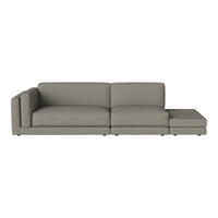 Modern gray sectional sofa with minimalist design and soft fabric upholstery. Perfect for contemporary living spaces.