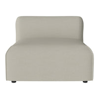 Neutral beige upholstered chair with a smooth, minimalist design, ideal for modern decor.
