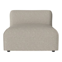 Light beige upholstered chair with a smooth, textured fabric pattern. Minimalist design with rounded edges.