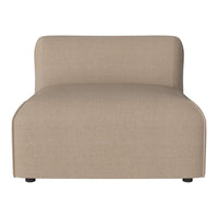 Beige upholstered chaise lounge with a smooth, minimalist design and subtle texture. Perfect for modern decor.