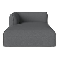 Gray upholstered chaise lounge with a smooth, textured fabric and minimalist modern design.