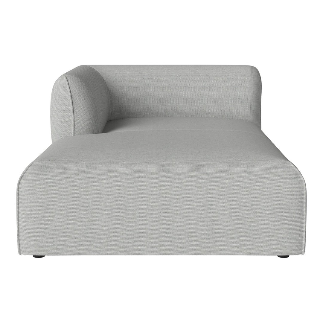 Light gray modern chaise lounge with minimalist design and smooth fabric texture. Ideal for contemporary decor.