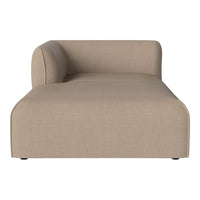 "Beige modern chaise lounge with a smooth, textured fabric and streamlined design."