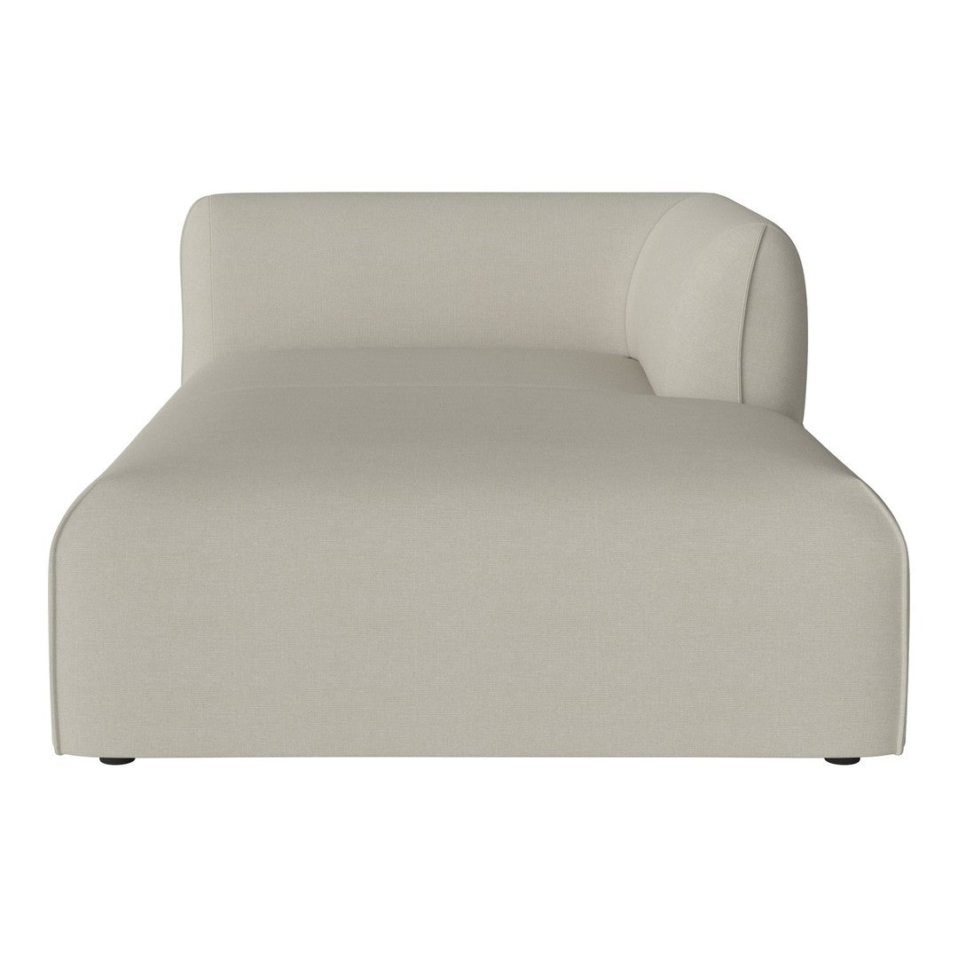 Light beige chaise lounge with smooth, minimalist design and subtle texture. Perfect for modern interiors.