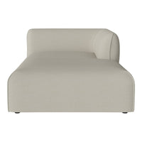 Light beige chaise lounge with smooth, minimalist design and subtle texture. Perfect for modern interiors.