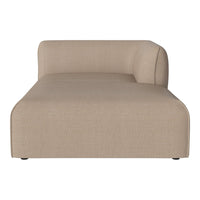 Beige upholstered chaise lounge with a smooth texture and modern, minimalist design. Ideal for stylish living spaces.