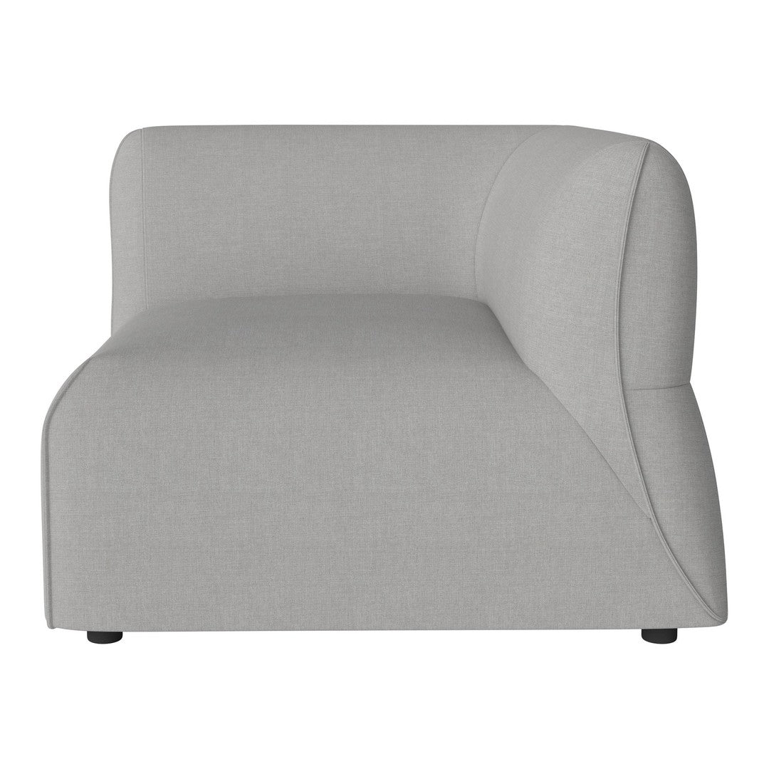 Modern curved sofa in soft light gray fabric, featuring a sleek, minimalist design with no patterns.