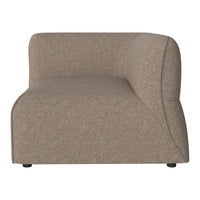 Textured beige upholstered sofa with a modern, curved design and clean lines, perfect for minimalist decor.