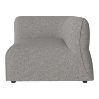 Gray upholstered accent chair with a smooth, rounded silhouette and textured fabric pattern. Perfect for modern decor.