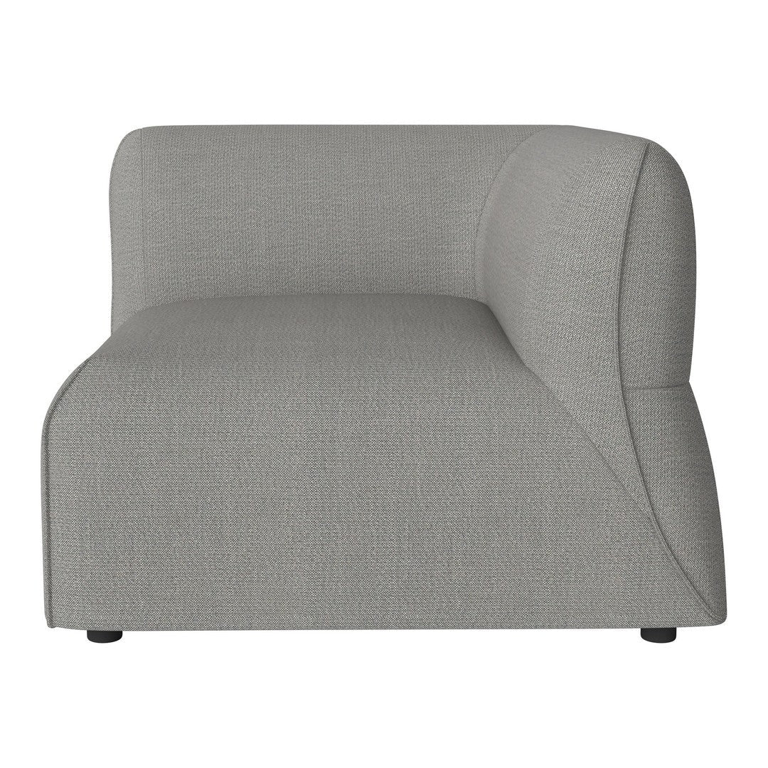 Soft gray modular sofa section with a smooth, textured fabric and modern curved design. Perfect for contemporary decor.