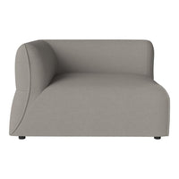 Gray curved sofa with a smooth, minimalist design and subtle texture. Perfect for modern interiors.