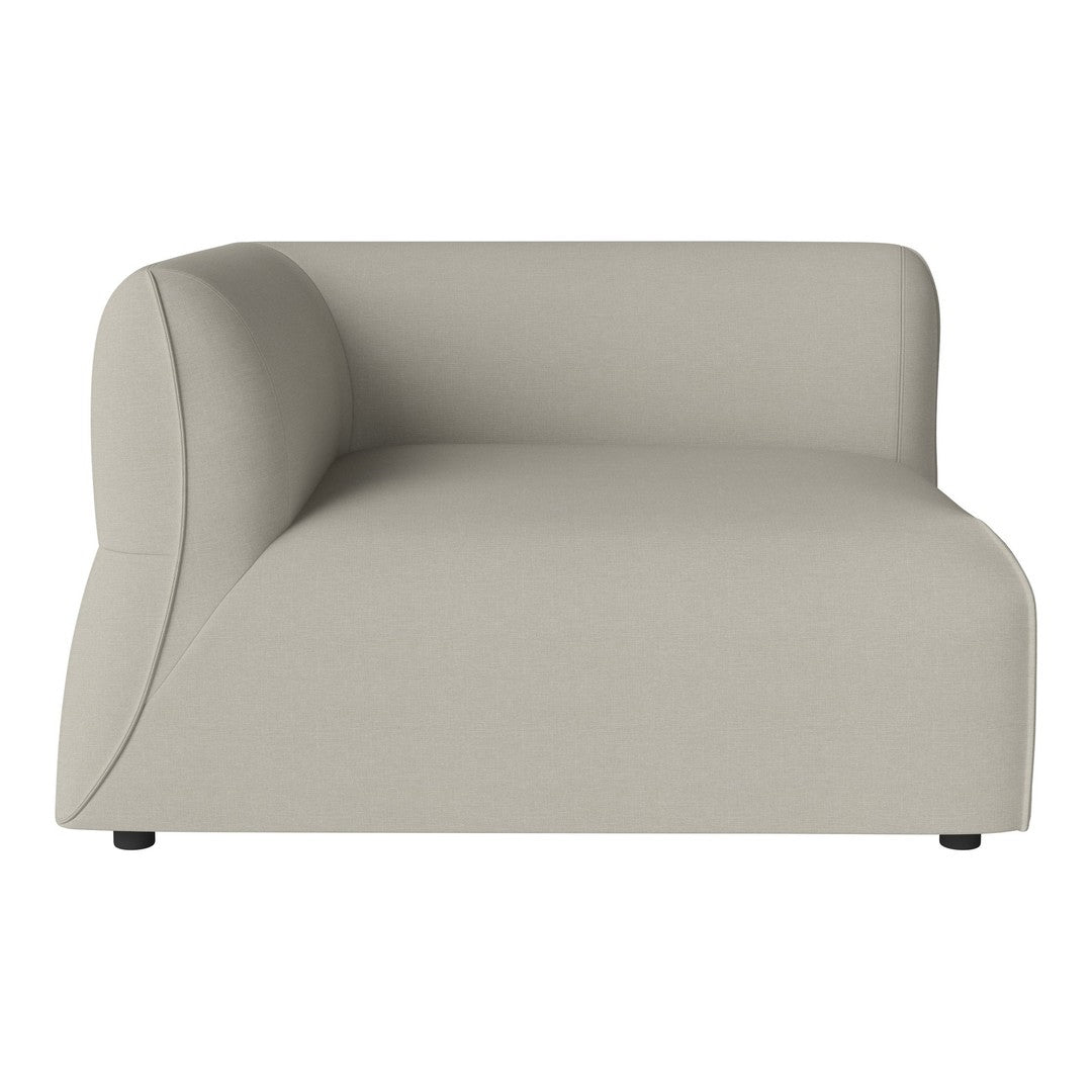 Light beige curved sofa with a smooth, minimalist design and no visible patterns, perfect for modern decor.