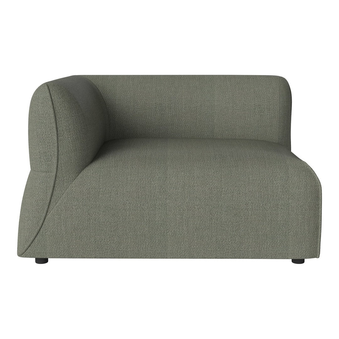 Green upholstered modular sofa with a smooth, curved design and subtle texture. Perfect for modern interiors.